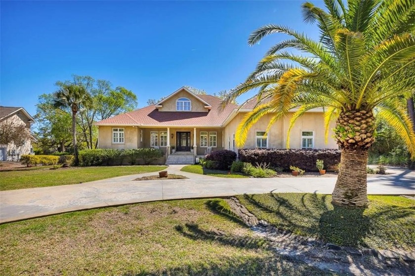 Welcome Home to this stunning 5-bedroom, 5-bathroom sanctuary - Beach Home for sale in Brunswick, Georgia on Beachhouse.com