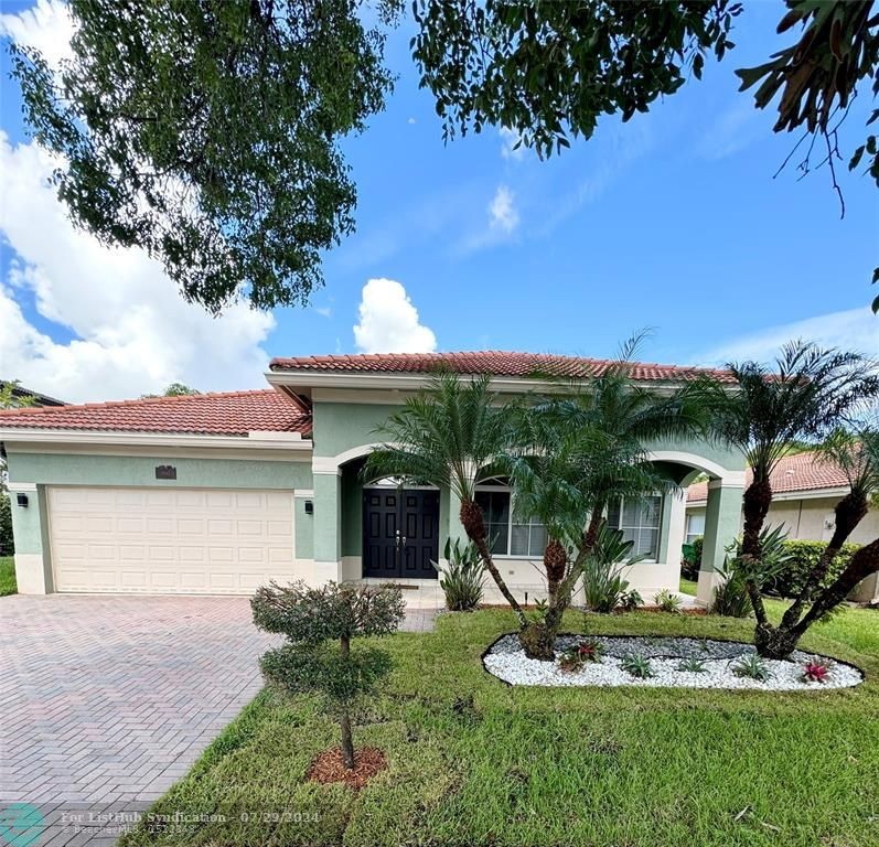 WELCOME TO THIS IMMACULATE LAKE FRONT HOME IN THE DESIRED GATED - Beach Home for sale in Miramar, Florida on Beachhouse.com