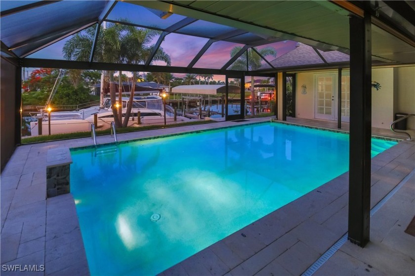 Welcome to coastal elegance at its finest! Nestled along a - Beach Home for sale in Cape Coral, Florida on Beachhouse.com