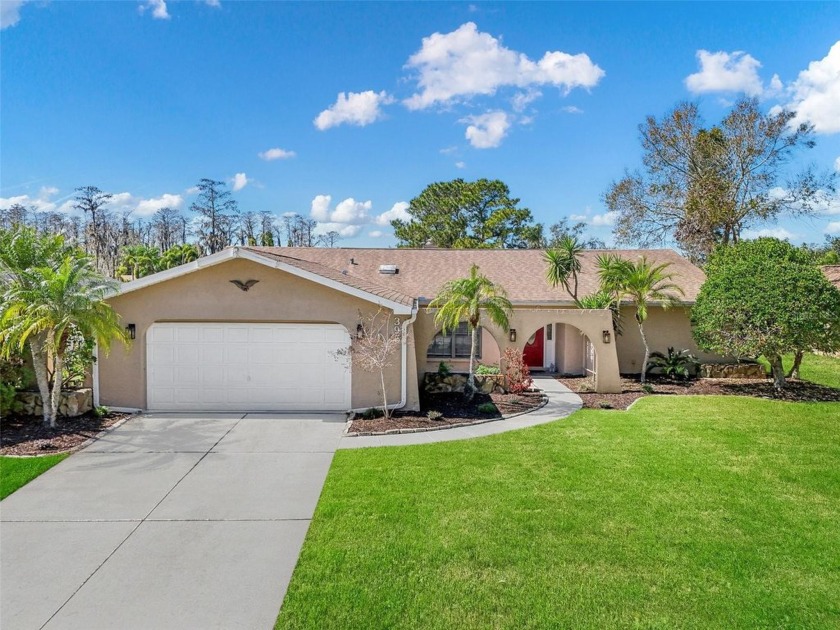 Major Price Improvement!  This 3 Bedroom, 2 bath POOL home sits - Beach Home for sale in Oldsmar, Florida on Beachhouse.com