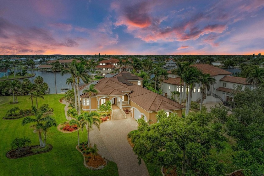 Welcome to Grassy Point Yacht Club, a rare 24-hour gated estate - Beach Home for sale in Port Charlotte, Florida on Beachhouse.com