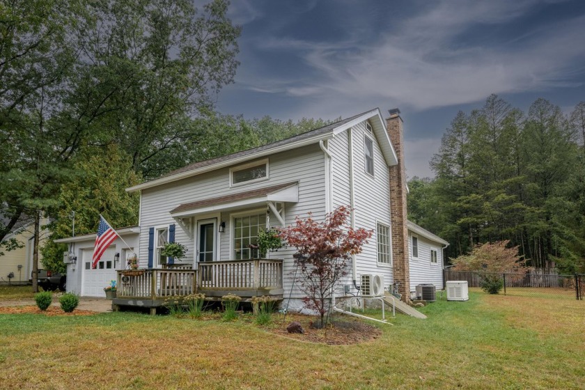 This charming home, set in the scenic Village of Pentwater - Beach Home for sale in Pentwater, Michigan on Beachhouse.com