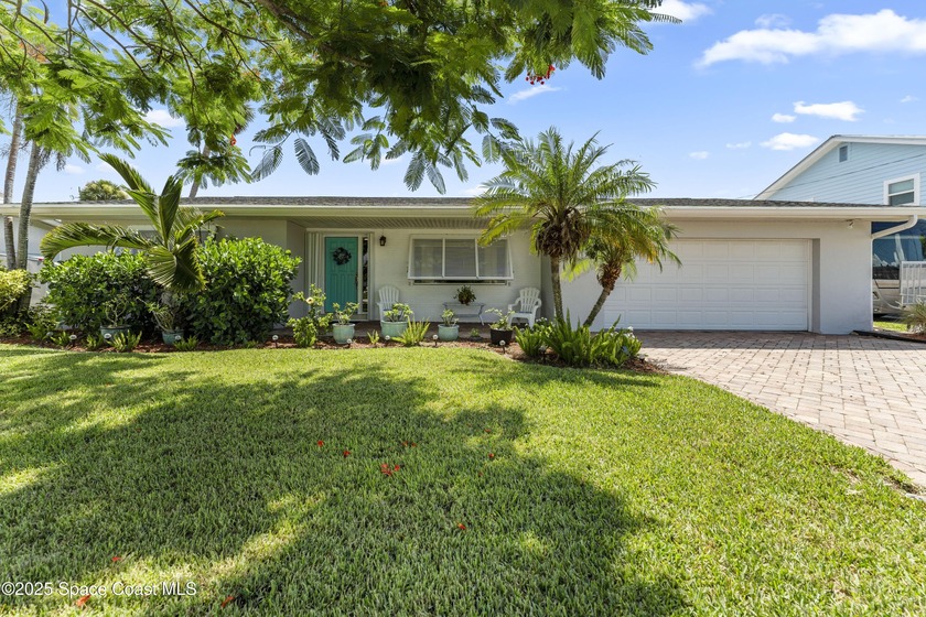 Just minutes from the beach, this beautifully remodeled - Beach Home for sale in Indian Harbour Beach, Florida on Beachhouse.com