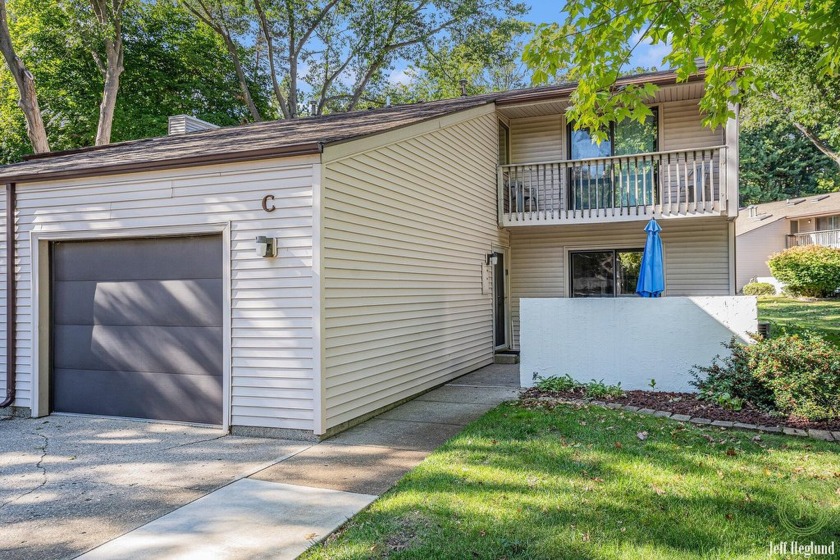 This stunning condo is the perfect blend of comfort and style - Beach Condo for sale in Spring Lake, Michigan on Beachhouse.com