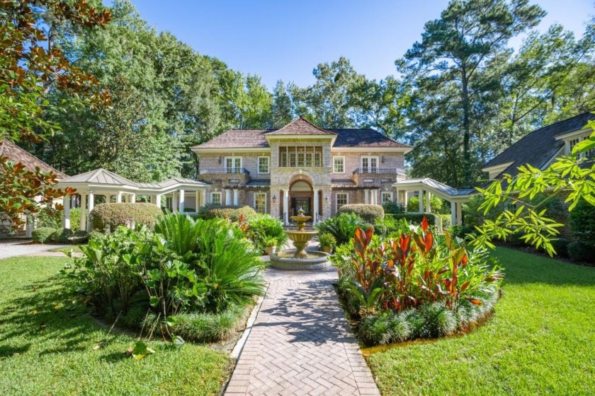 Stunning estate tucked away on an ultra private lot in the - Beach Home for sale in Richmond Hill, Georgia on Beachhouse.com