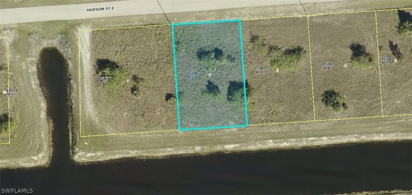 This perfectly placed lot, with a canal in the rear has - Beach Lot for sale in Lehigh Acres, Florida on Beachhouse.com