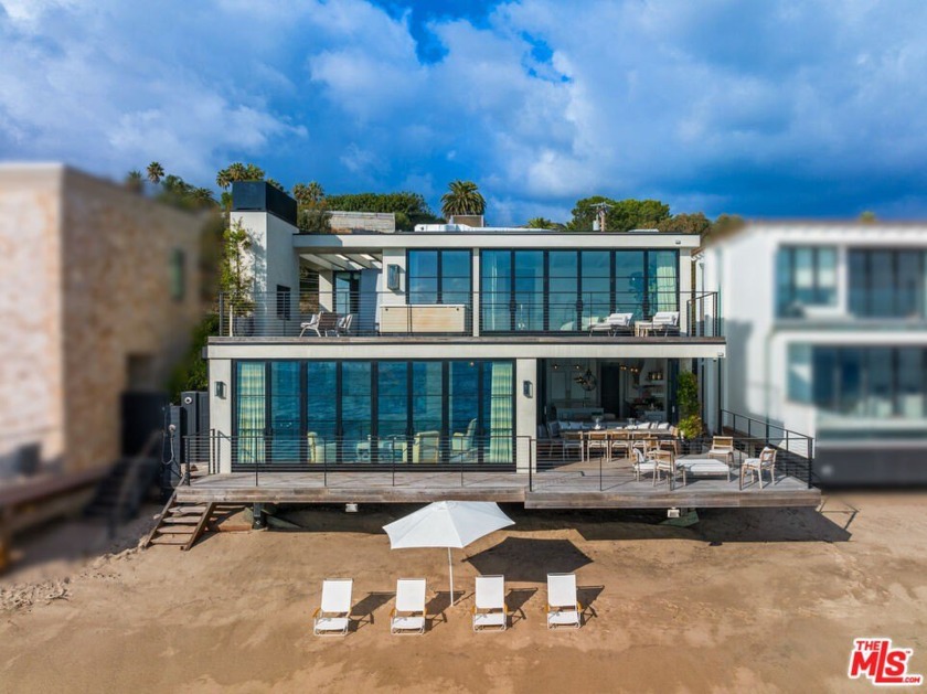 A perfect beachfront setting on a private road off Pacific Coast - Beach Home for sale in Malibu, California on Beachhouse.com