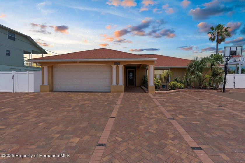 A RARE GEM WITH CANAL FRONT VIEWS -- NO HOA, NO SHORT-TERM - Beach Home for sale in Hernando Beach, Florida on Beachhouse.com