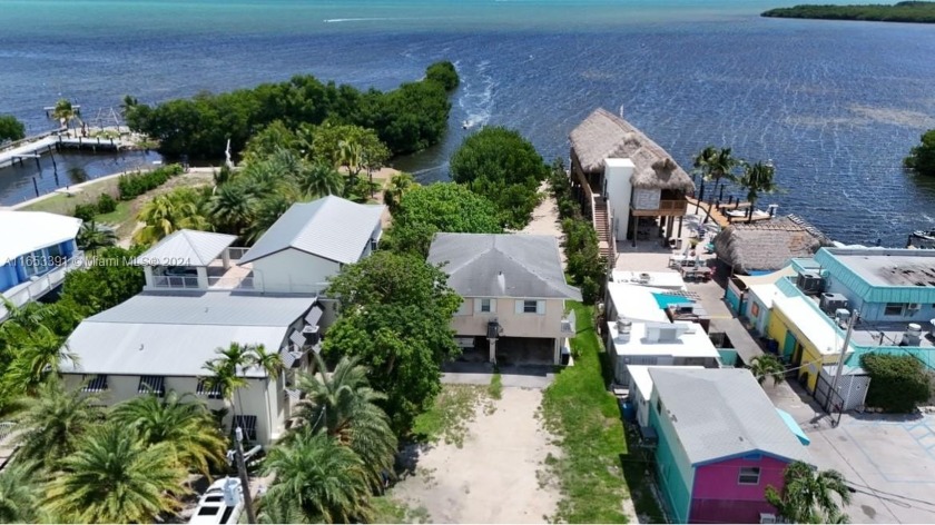 Beautiful oceanfront home. Enjoy island living with a view of - Beach Home for sale in Key Largo, Florida on Beachhouse.com