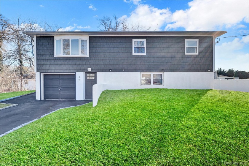 Welcome to a beautifully newly renovated home tucked away in the - Beach Home for sale in East Patchogue, New York on Beachhouse.com