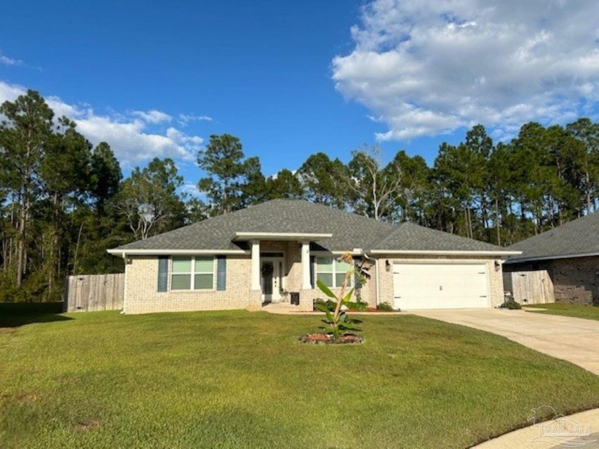 SPACIOUS 4 BEDROOM, 2 BATH BRICK HOUSE IN A QUIET NEIGHBORHOOD - Beach Home for sale in Navarre, Florida on Beachhouse.com