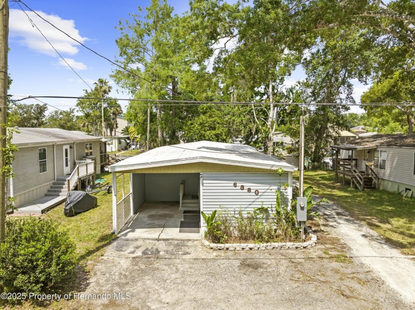 Live where others vacation! This fully remodeled 4-bedroom - Beach Home for sale in Weeki Wachee, Florida on Beachhouse.com