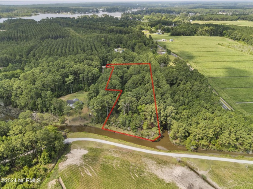 Discover a rare opportunity to own a wooded waterfront lot at - Beach Acreage for sale in Merritt, North Carolina on Beachhouse.com