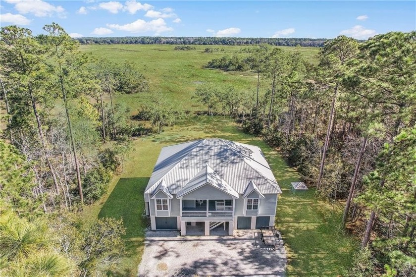 ON OVER 4 ACRES OF LAND IN THE REFUGE AT BELVEDERE ISLAND - Beach Home for sale in Townsend, Georgia on Beachhouse.com