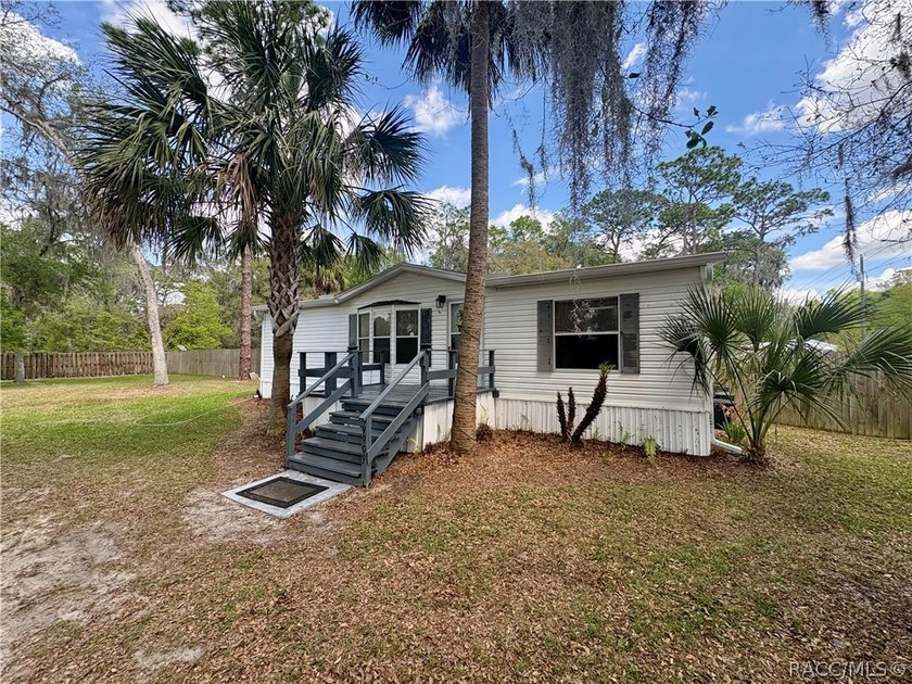 Escape the hustle and discover peaceful living. Nestled on a - Beach Home for sale in Crystal River, Florida on Beachhouse.com