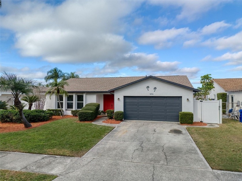 This tres chic 3 bedroom, 2 bath pool home sits gracefully on - Beach Home for sale in Dunedin, Florida on Beachhouse.com