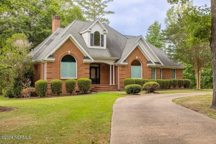 Waterfront home located on the water in a gated community called - Beach Home for sale in Hertford, North Carolina on Beachhouse.com