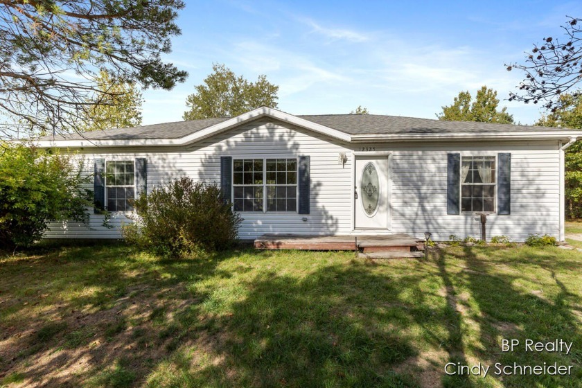 Tucked away at the end of a private road, this 3-bedroom, 2-bath - Beach Home for sale in Grand Haven, Michigan on Beachhouse.com