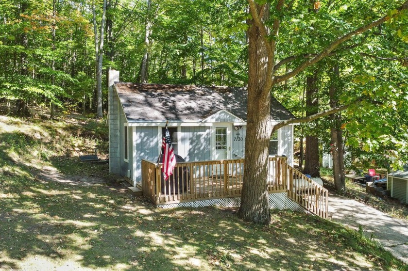 Welcome to 7130 North Poplar Road! Discover this charming - Beach Home for sale in Free Soil, Michigan on Beachhouse.com