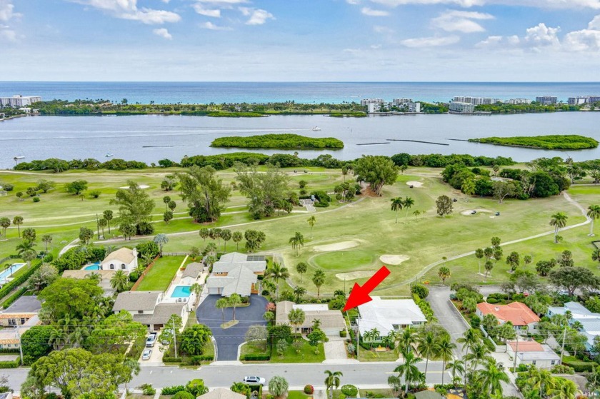 This immaculately maintained Midcentury home is nestled along - Beach Home for sale in Lake Worth Beach, Florida on Beachhouse.com