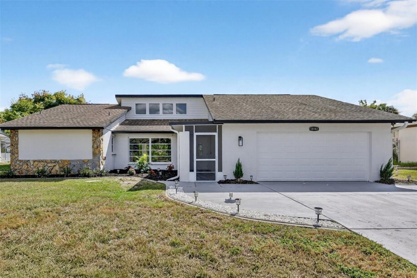 Welcome to this beautifully renovated 3-bedroom, 2-bathroom home - Beach Home for sale in Port Charlotte, Florida on Beachhouse.com