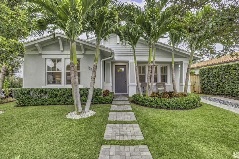 You'll find easy living in this move-in ready Arts and Crafts - Beach Home for sale in Lake Worth Beach, Florida on Beachhouse.com
