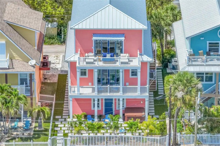 Experience luxury coastal living at *The Pink House,* a - Beach Home for sale in Gulfport, Florida on Beachhouse.com