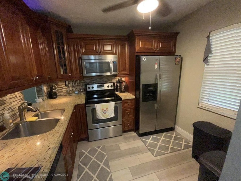 Beautiful 2/2 condo located in a gated community with 24 hour - Beach Condo for sale in Lauderdale Lakes, Florida on Beachhouse.com