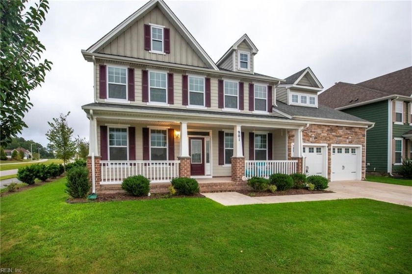 Enjoy serene lake and fountain views from the front porch of - Beach Home for sale in Chesapeake, Virginia on Beachhouse.com