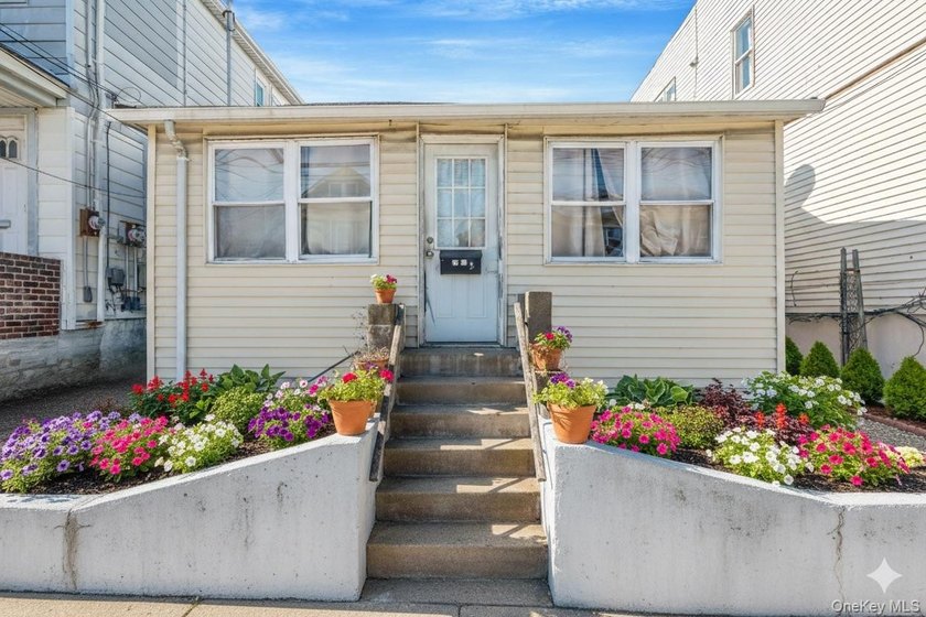 Located in the heart of College Point, this 2 bedroom, 1 bath - Beach Home for sale in College Point, New York on Beachhouse.com