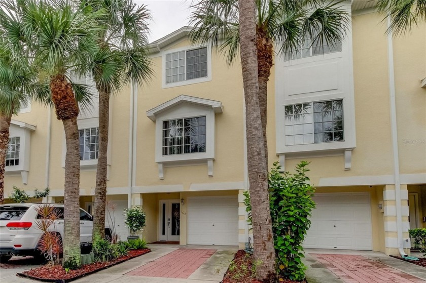 Nestled in a serene, small gated community, this exquisite - Beach Townhome/Townhouse for sale in Oldsmar, Florida on Beachhouse.com