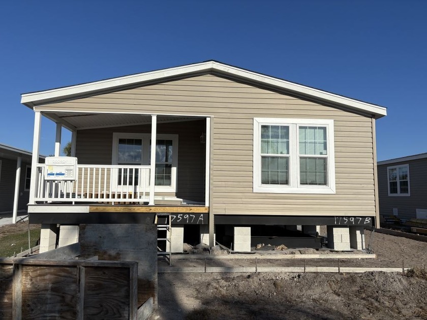 Welcome to Palm Lake Estates, a 55+ age-qualified community - Beach Home for sale in Riviera Beach, Florida on Beachhouse.com