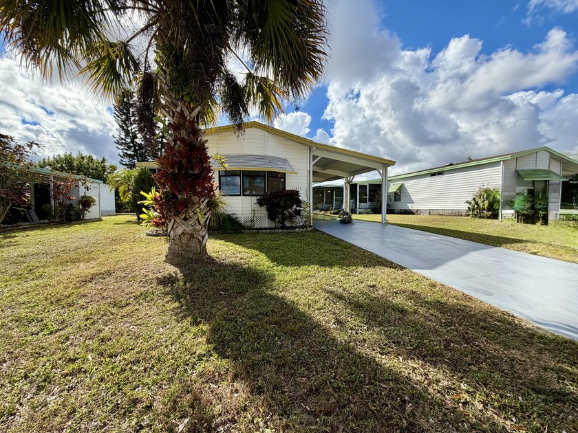 Welcome to your slice of paradise in the vibrant, 55+ Spanish - Beach Home for sale in Fort Pierce, Florida on Beachhouse.com