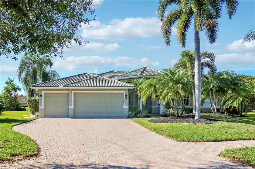 Beautiful 4-bedroom 3-bath 3-car garage lakefront home on one of - Beach Home for sale in Palm City, Florida on Beachhouse.com