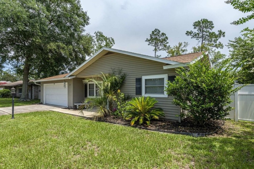 Welcome To This Well-maintained 3-bedroom,2-bath Home That - Beach Home for sale in Palm Coast, Florida on Beachhouse.com
