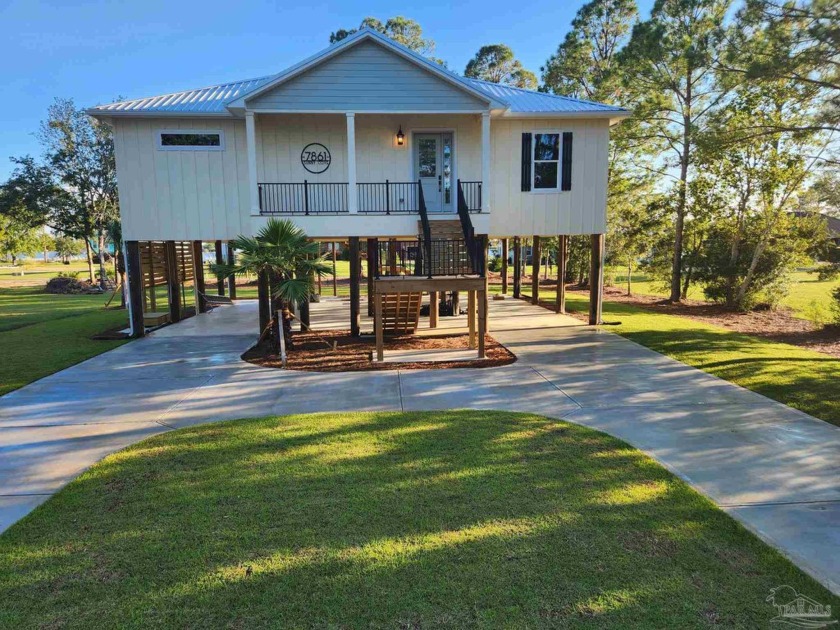 Paradise Found! This BRAND-NEW 3-bedroom, 2-bath custom-built - Beach Home for sale in Milton, Florida on Beachhouse.com