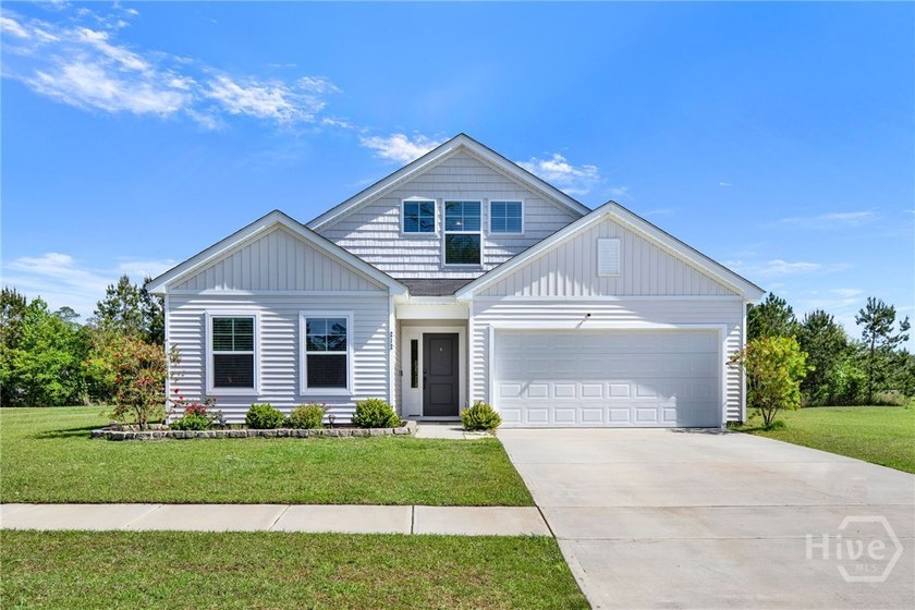 Set on 1.22 acres with a low HOA and pond view, this 3-bedroom - Beach Home for sale in Midway, Georgia on Beachhouse.com