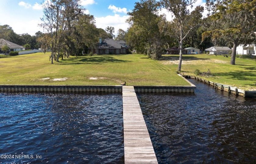 Stunning waterfront property located on over 1.5 acres along the - Beach Home for sale in Fleming Island, Florida on Beachhouse.com