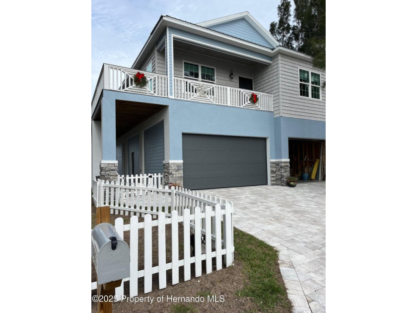Escape the hustle and bustle and embrace the quiet charm of this - Beach Home for sale in Spring Hill, Florida on Beachhouse.com