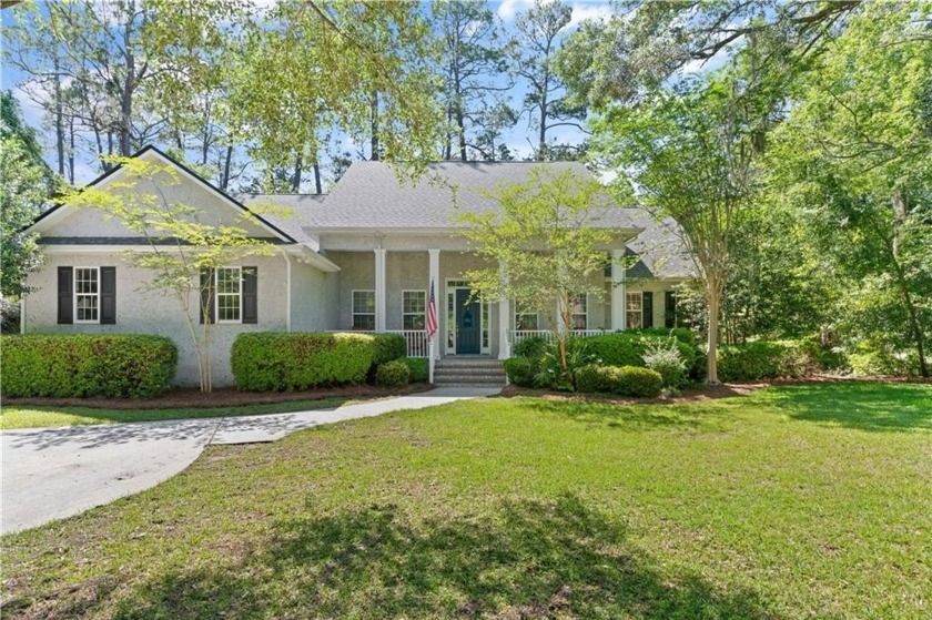 Tucked behind a canopy of mature trees, this beautifully - Beach Home for sale in Brunswick, Georgia on Beachhouse.com