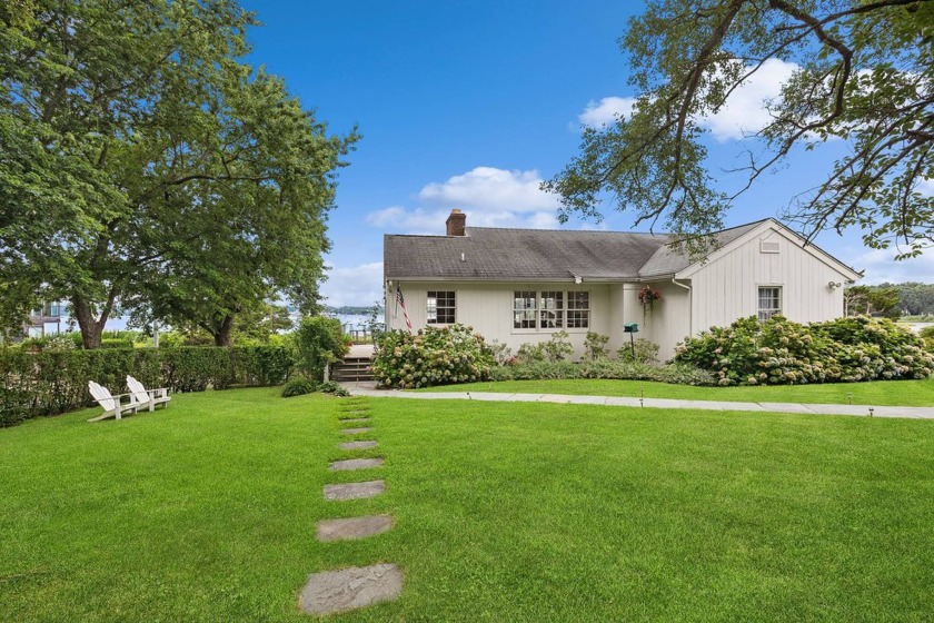 This inviting 2,200+- sq. ft. cottage, situated on 0.75 acres of - Beach Home for sale in Sag Harbor, New York on Beachhouse.com