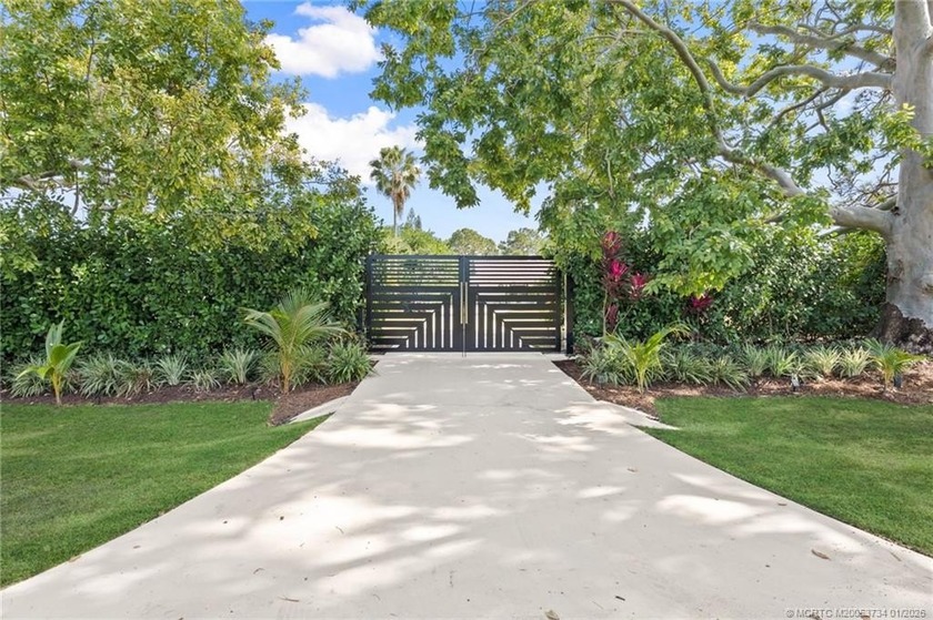 The Ultimate in Living Enjoyment! Set on 3.47 acres in the - Beach Home for sale in Palm City, Florida on Beachhouse.com