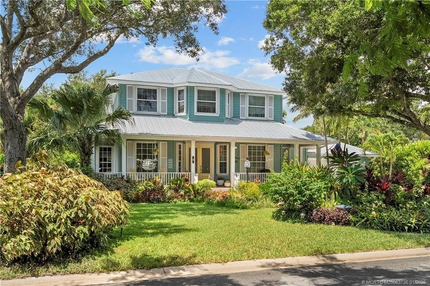 Nestled on a private, tree-lined street in Sewall's Point, this - Beach Home for sale in Sewalls Point, Florida on Beachhouse.com