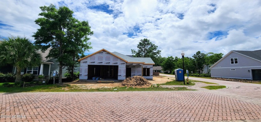 Discover coastal living at its finest in this new listing at - Beach Home for sale in Shallotte, North Carolina on Beachhouse.com