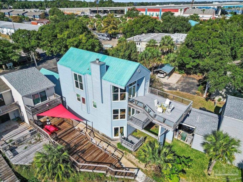 Beautiful bay view off Bayou Chico! Entry level welcomes a - Beach Home for sale in Pensacola, Florida on Beachhouse.com