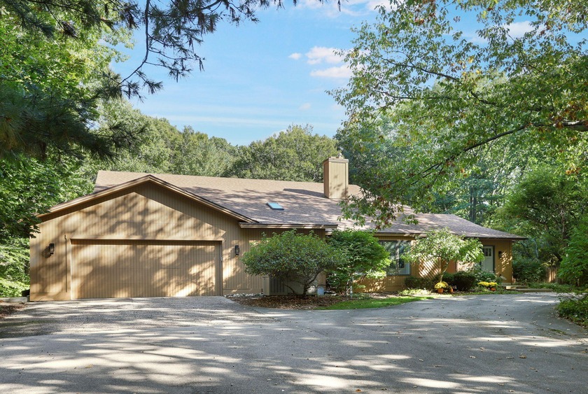 You'll never want to leave this beautiful retreat nestled in the - Beach Home for sale in Holland, Michigan on Beachhouse.com