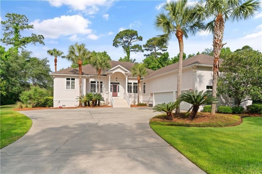 Nestled on a picturesque half-acre lot on the desirable Oak - Beach Home for sale in Brunswick, Georgia on Beachhouse.com