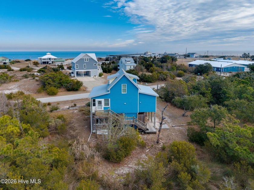 Discover the charm of coastal living in this cozy Cedar Island - Beach Home for sale in Cedar Island, North Carolina on Beachhouse.com