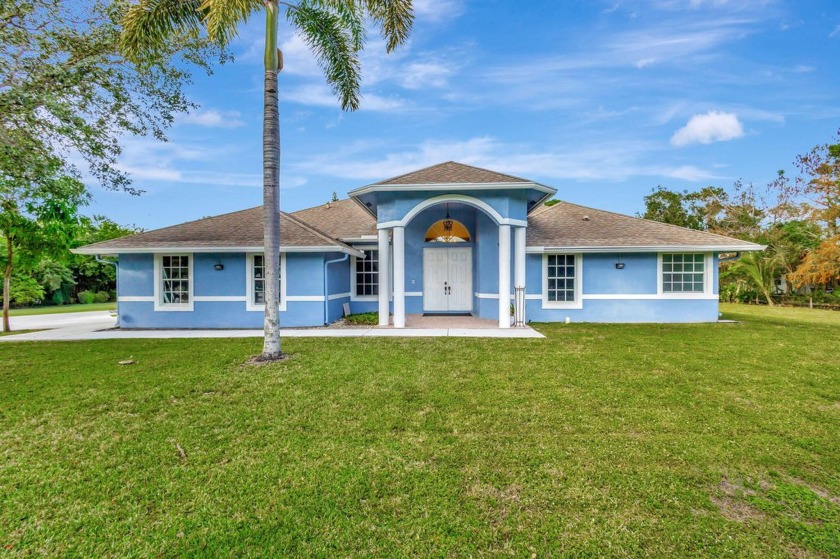 Spacious CBS home on a 1.29 Acre Lot. 5 Bedrooms and 3 Full - Beach Home for sale in West Palm Beach, Florida on Beachhouse.com