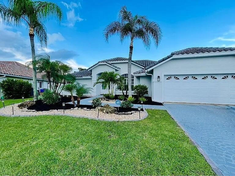 Experience the essence of the West Boca lifestyle in this - Beach Home for sale in Boca Raton, Florida on Beachhouse.com